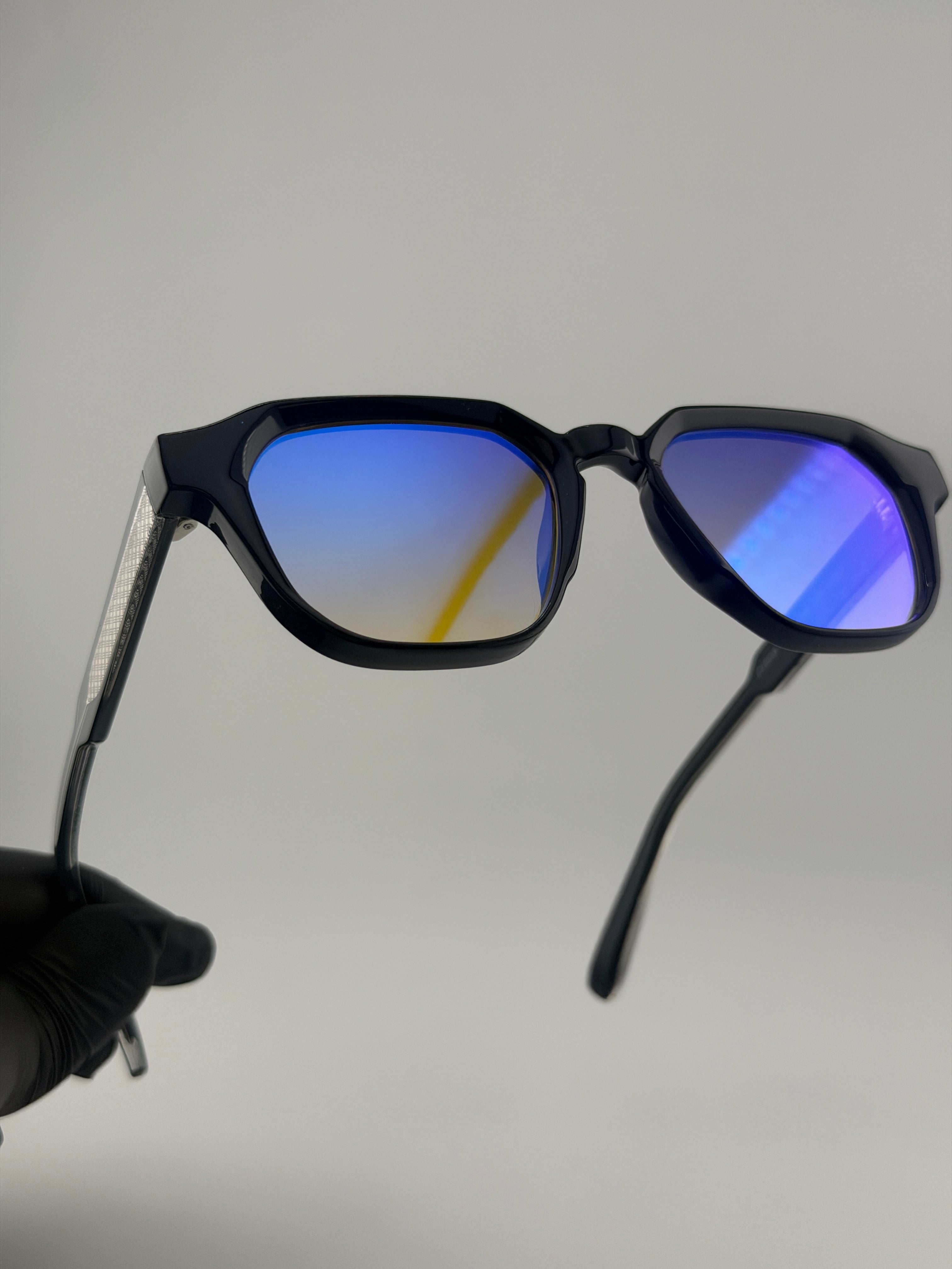 Prado noir reflet vert bleu